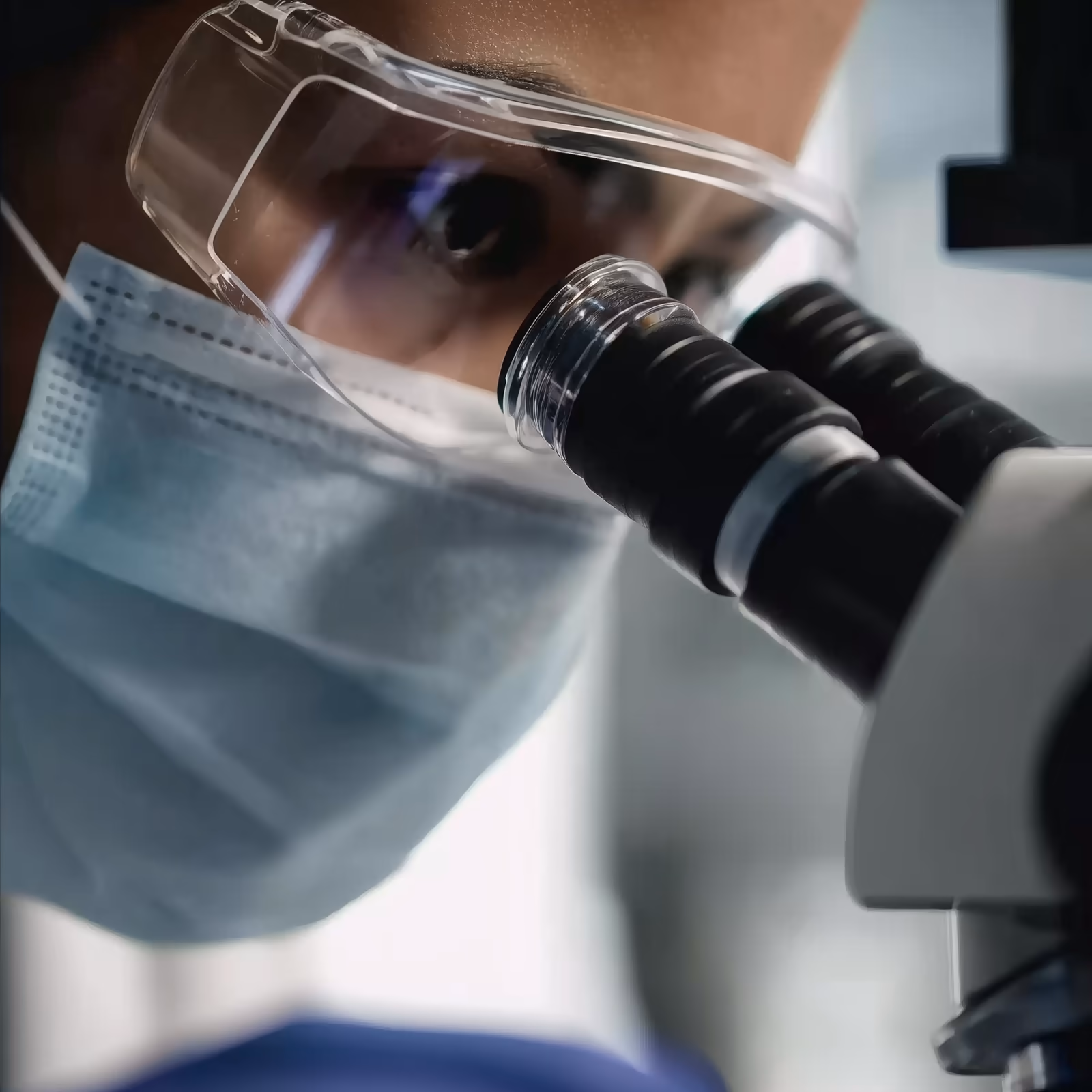 Scientist at a microscope